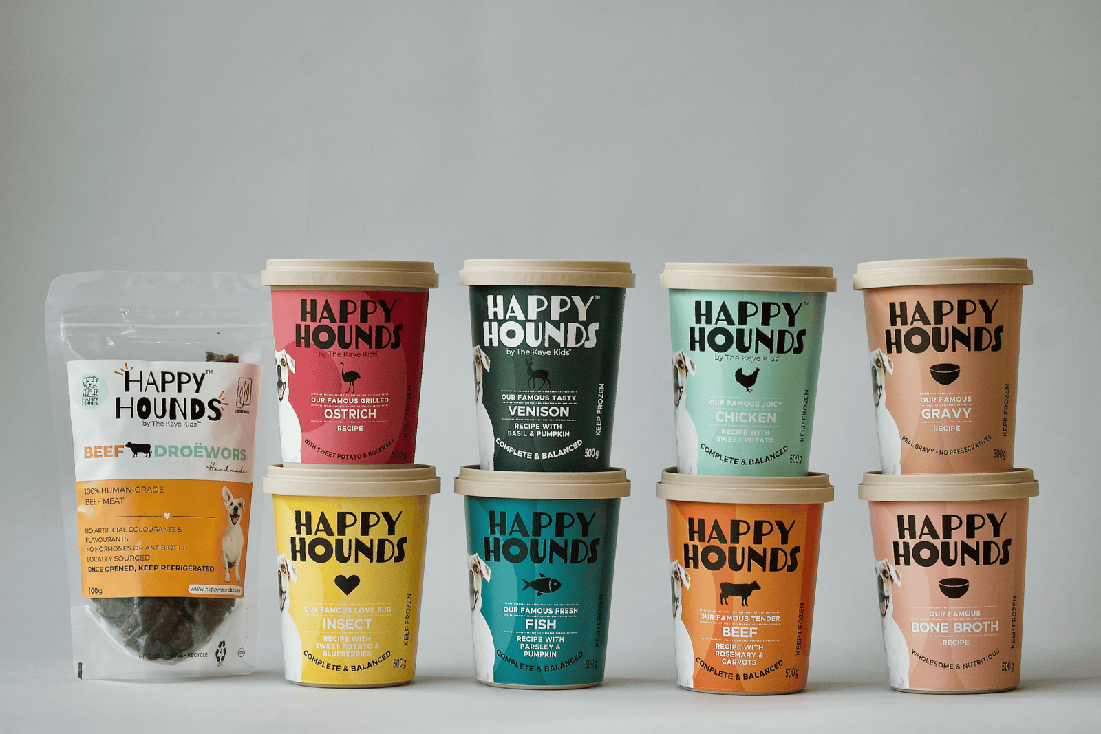 A Happy Hounds starter pack displayed on a light grey background.